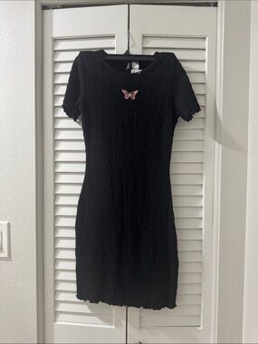 Black Short Sleeve Textured Dress with Pink Butterfly Accent